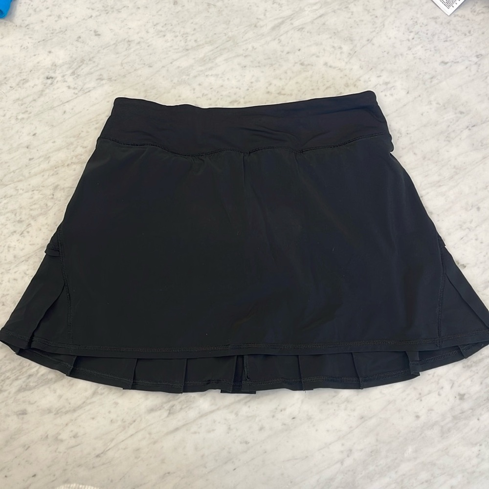Lululemon!  Athletic pleated skirt with built in shorts!